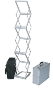 A ladder with six steps and a bag on the ground.